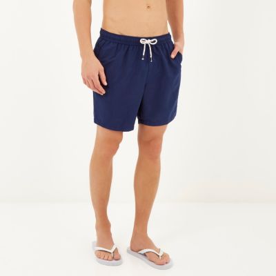 Navy mid length swim shorts